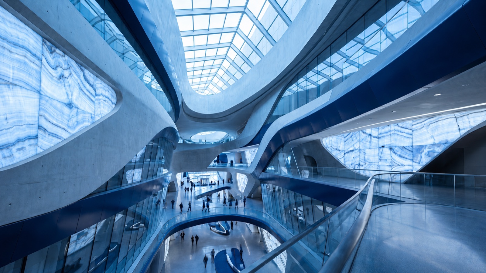Soaring modern architectural atrium with sculptural curves and blue light